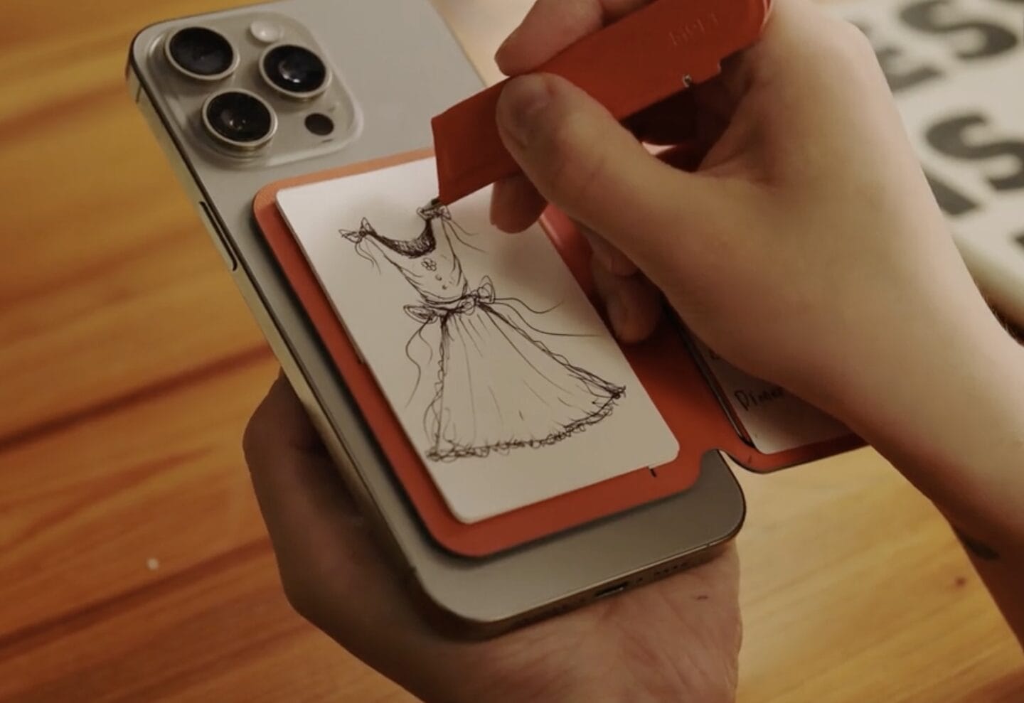 Moft Snap Flow iPhone stand with pen and paper