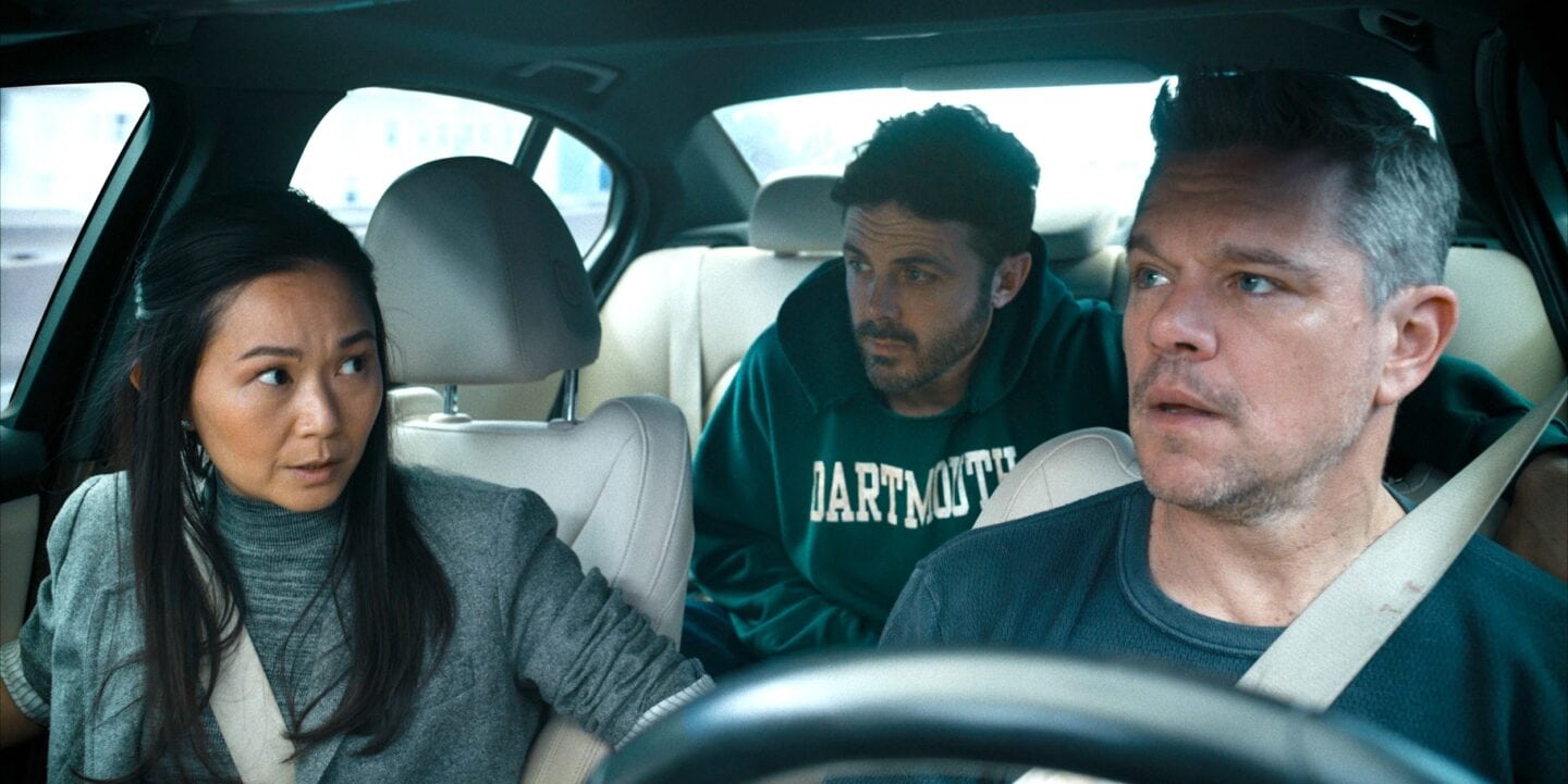 Hong Chau, Casey Affleck and Matt Damon in "The Instigators," a still from the Apple TV+ used to illustrate a review.
