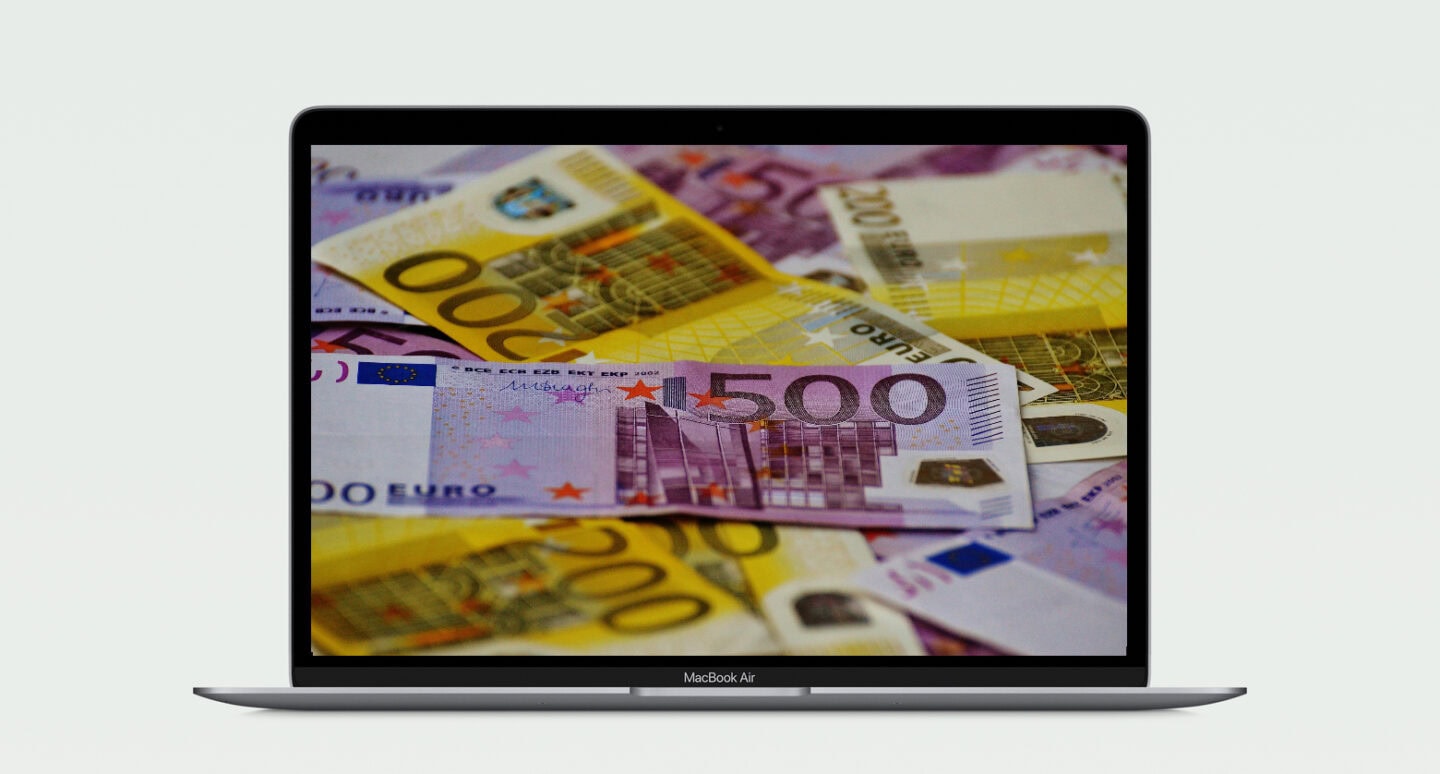 MacBook with Euros