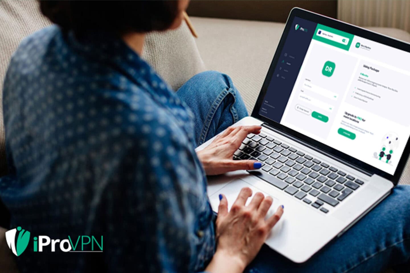 Woman looking at computer with iProVPN installed.