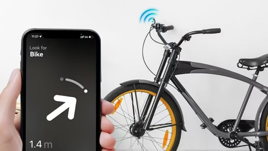 A person locating a bicycle that has a Find My-based bike tracker hidden in its bell, using a mobile app.