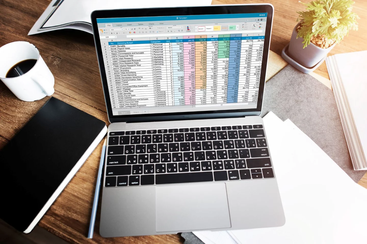 Photo of a laptop with a spreadsheet on it, used to illustrate a post about a deal on a Microsoft Excel training bundle.