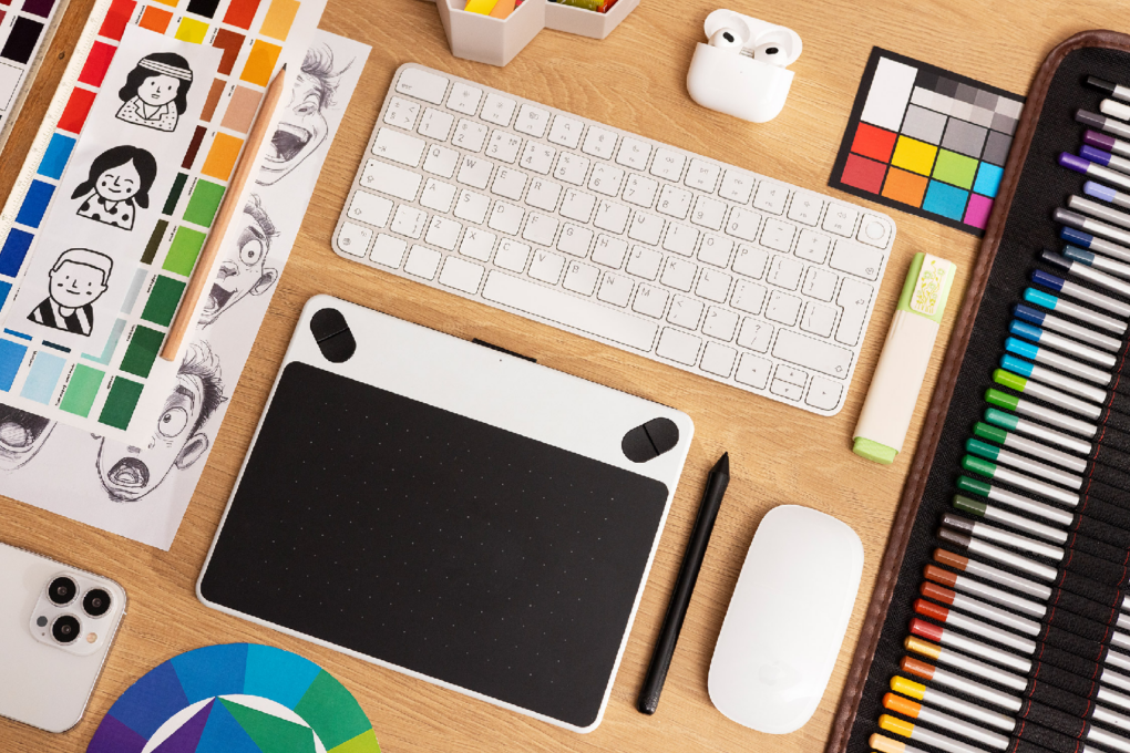 A photo of art materials and tools, used to illustrate a post about the Adobe courses in the 2025 All-in-One Creative Suite Bundle.