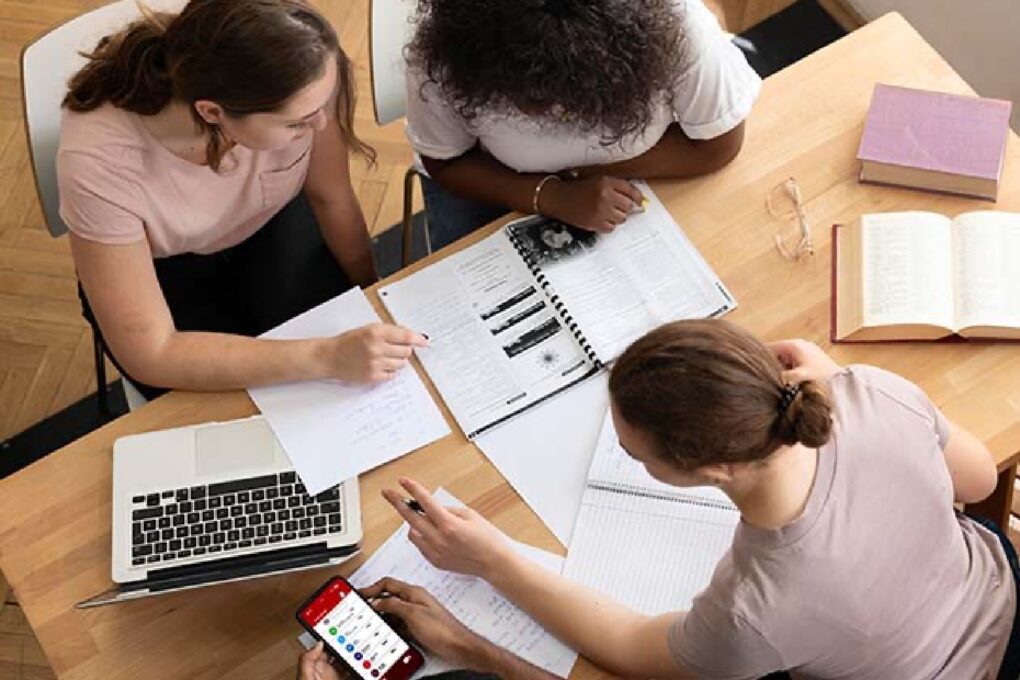 Four people studying together for IT exams