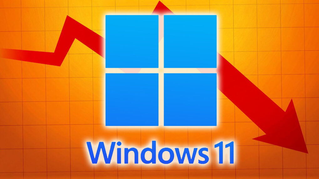 Image of Windows 11 logo with an arrow pointing down to illustrate an article about discounted Windows 11 Pro key