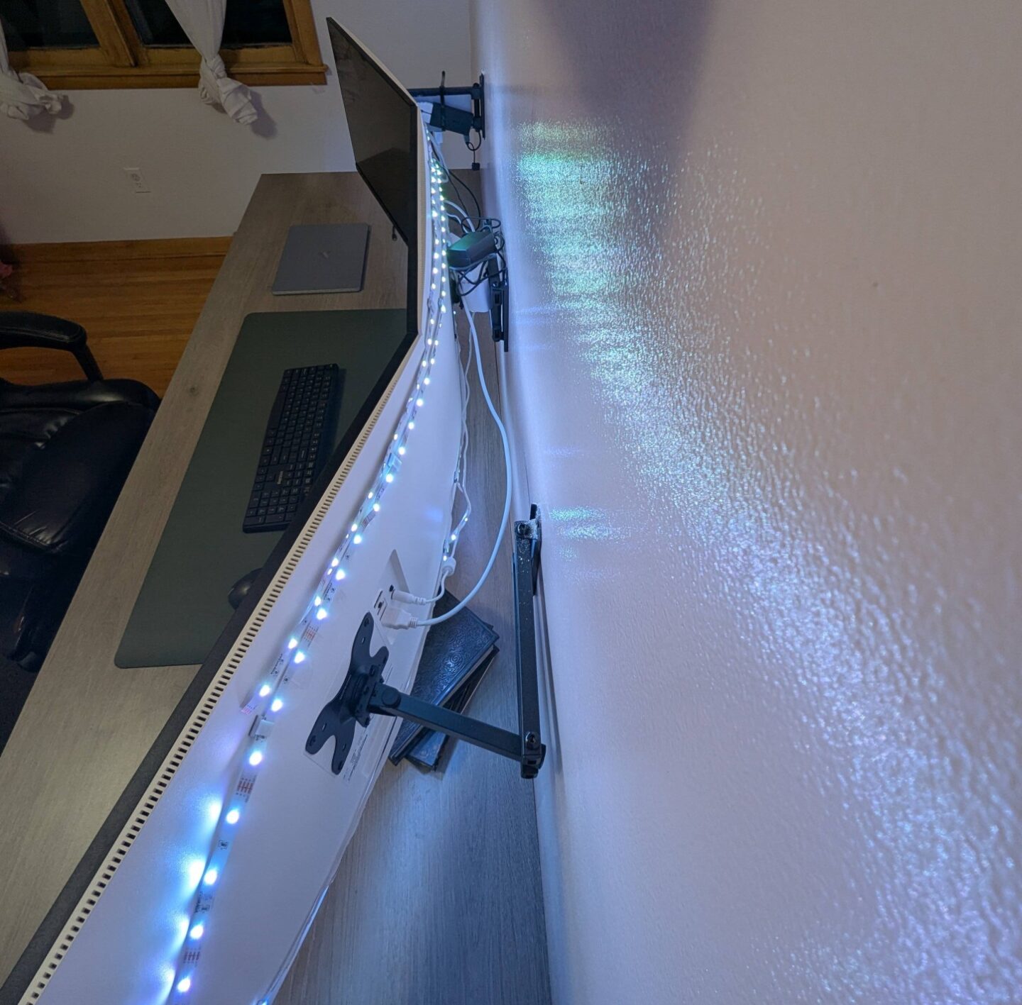 wall-mounted arms for external monitors