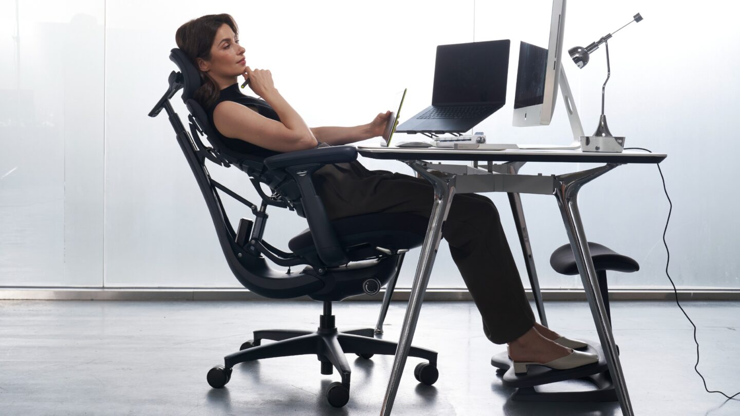 Photo of a woman sitting in LiberNovo Omni chair.