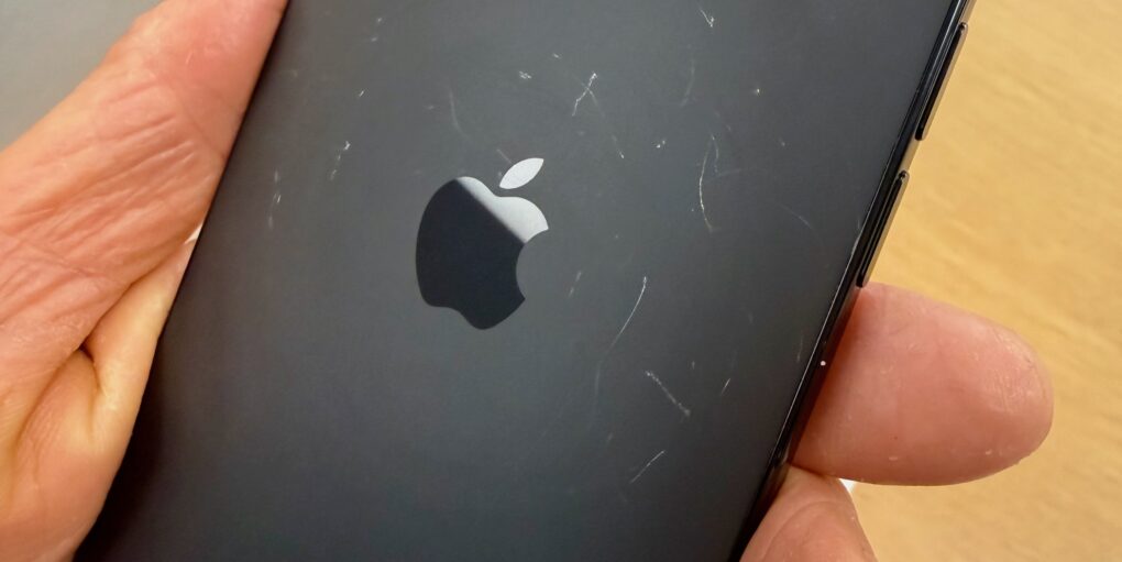 The back of a demo unit iPhone Air showing extensive scratches.