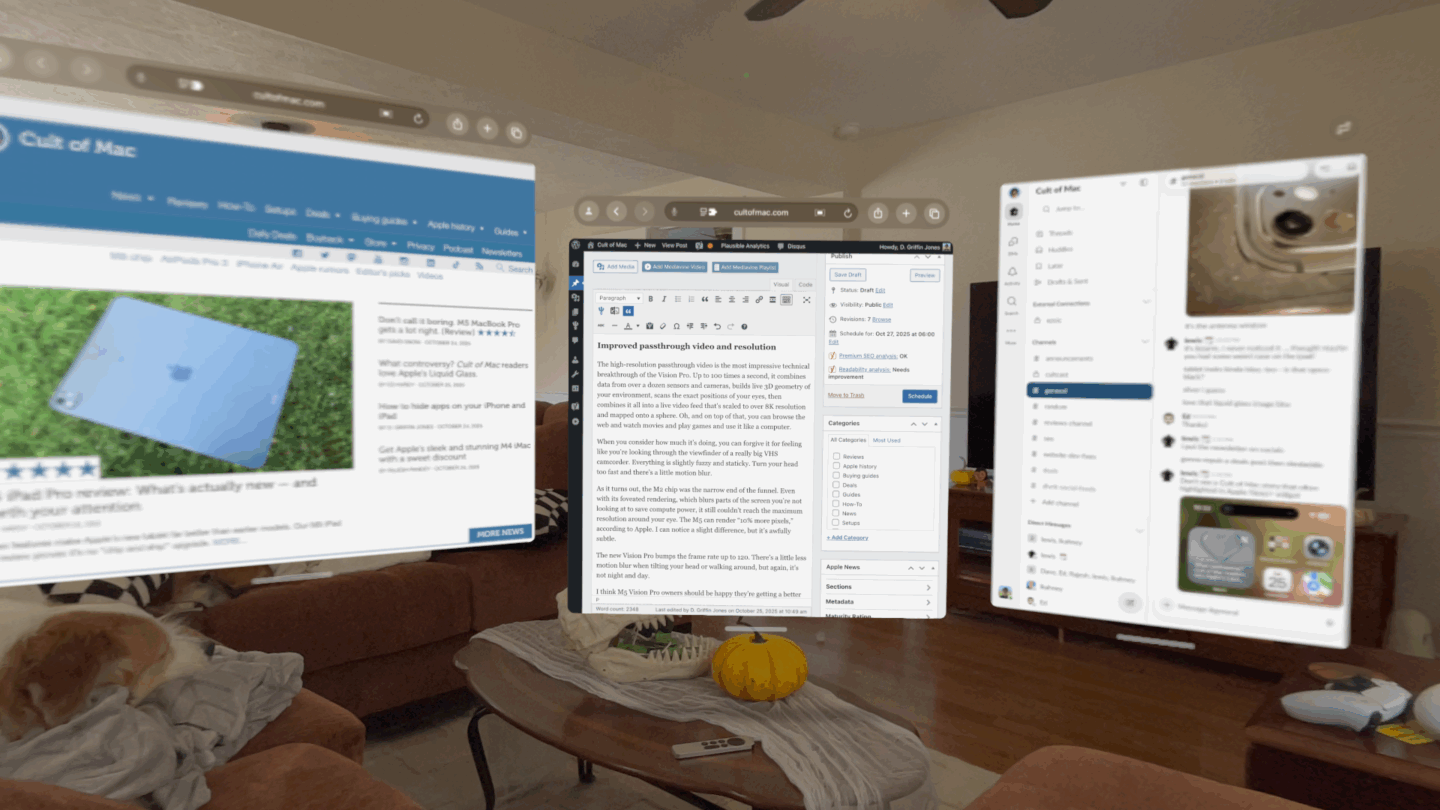 Writing in Vision Pro Screenshot writing this very article in the Vision Pro, alongside the Cult of Mac website and Slack apps, in a living room. If you peek, there are two dogs in the shot as well.