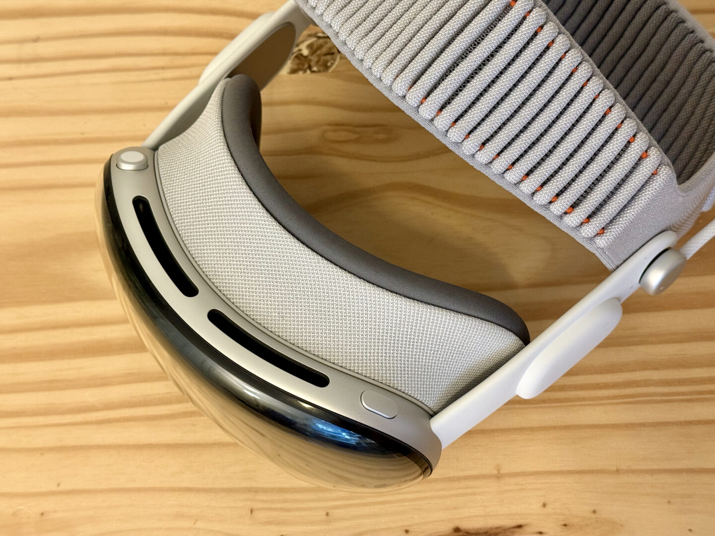 M5 Vision Pro Top Top of the M5 Vision Pro on a pine table