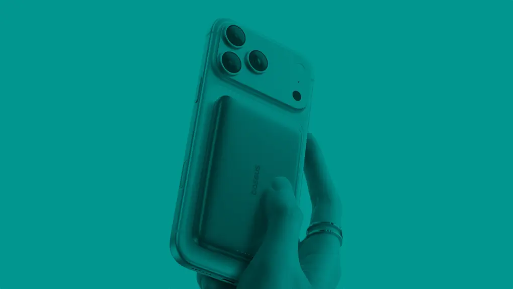 Photo of hand hodling iPhone 17 Pro with a Baseus Picogo Qi2 10K Portable Charger to illustrate guide to best iPhone accessories deals for Black Friday 2025