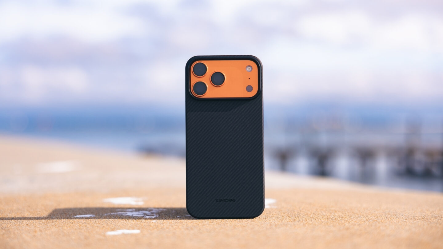 Photo of Thinborne iPhone 17 Pro aramid fiber super-thin case sitting on a table with blue sky in the background