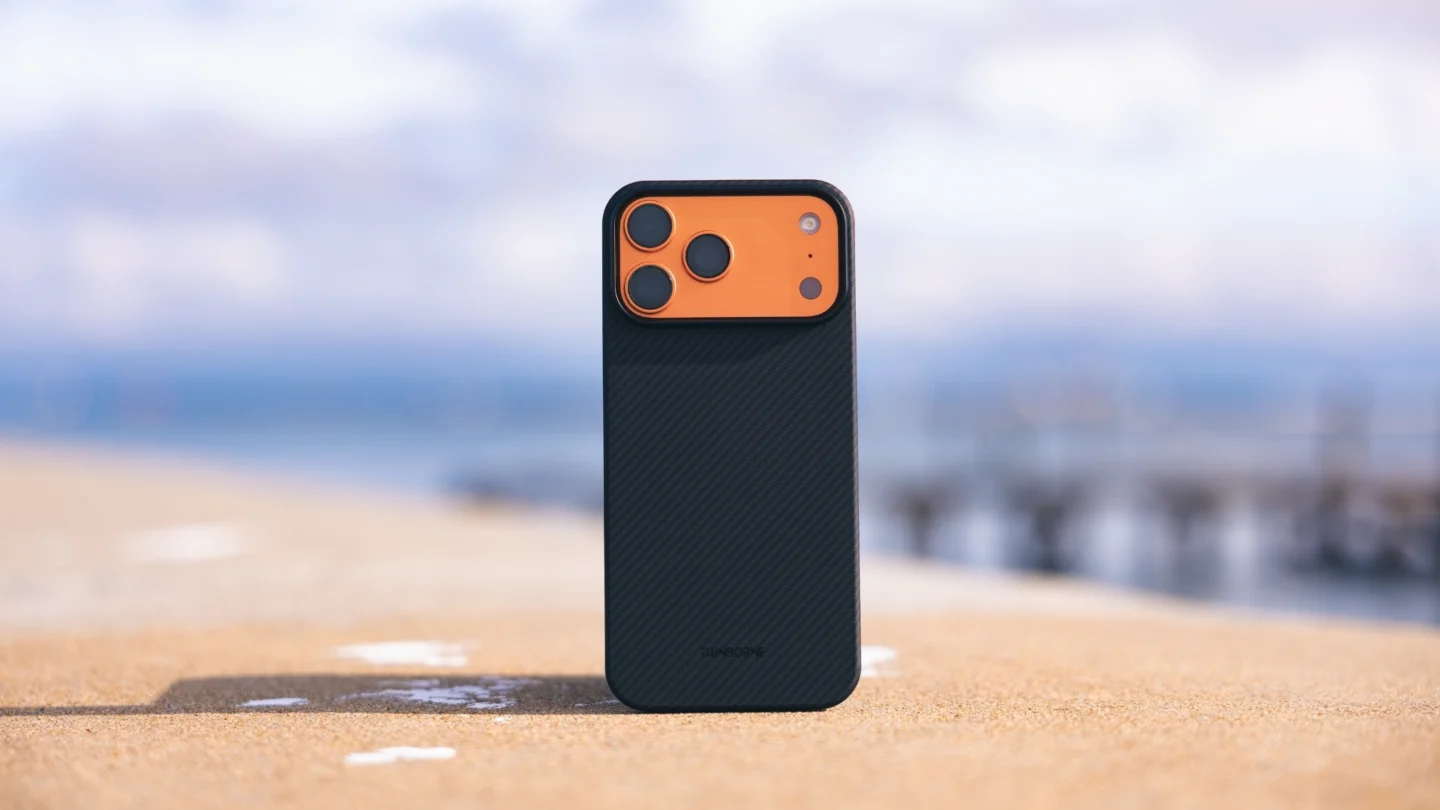 Photo of Thinborne iPhone 17 Pro aramid fiber super-thin case sitting on a table with blue sky in the background