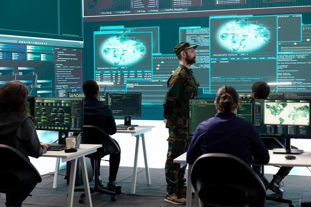 Classroom training led by a man wearing a military uniform