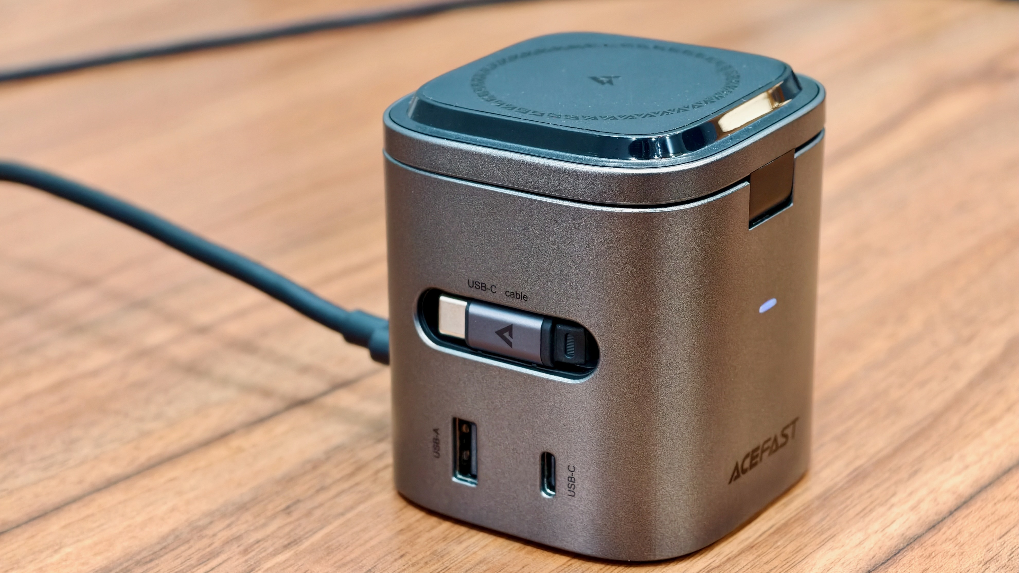 Built-in USB-C cable neatly retracts when not in use.