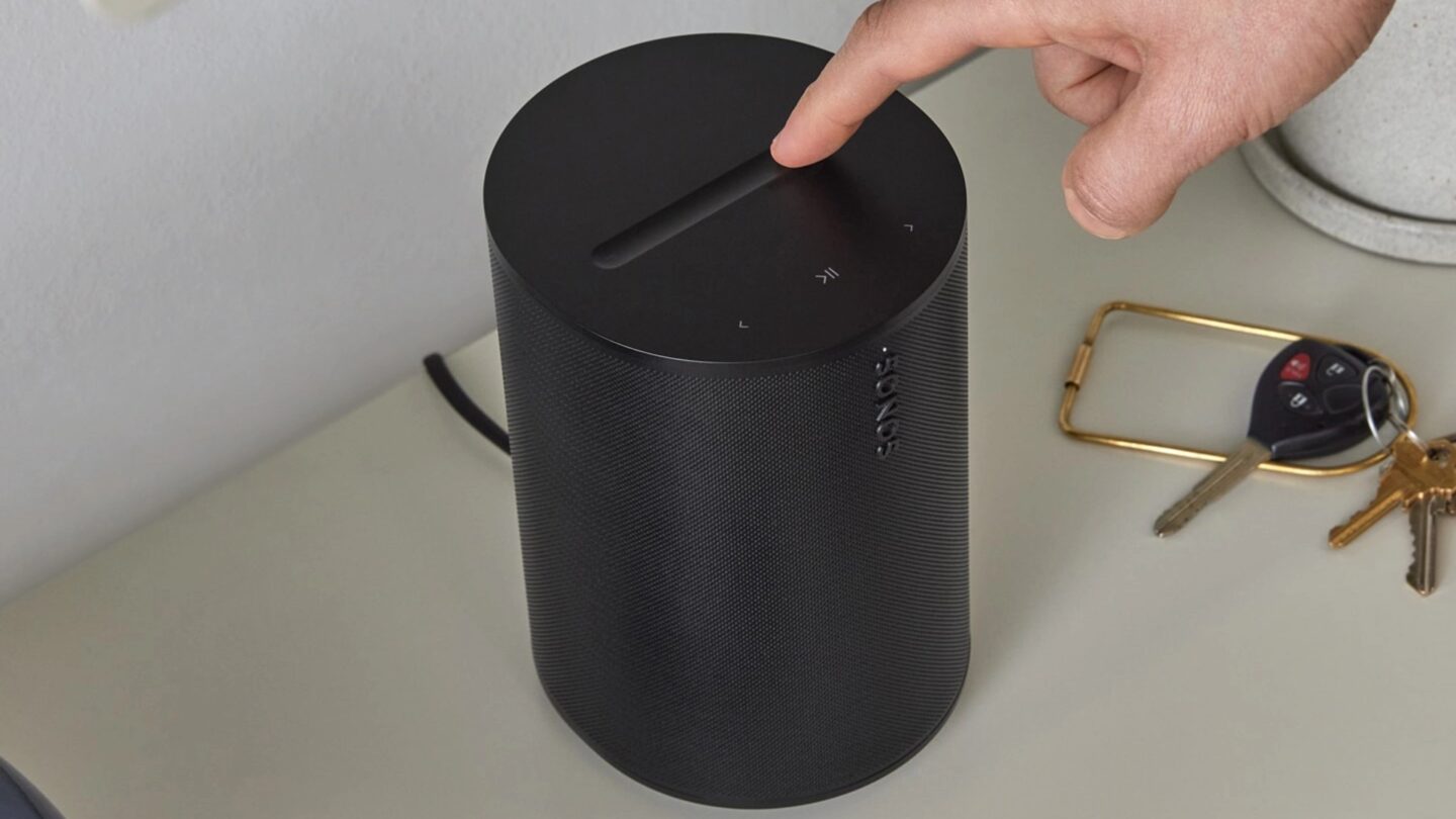 Sonos Era 100 SL with hand