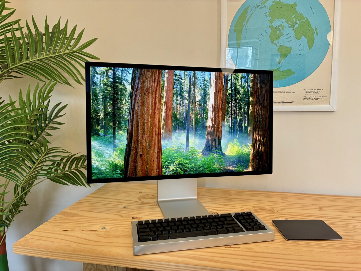 Studio Display XDR Aerial 1 The Studio Display XDR showing a sequoia Aerial screensaver