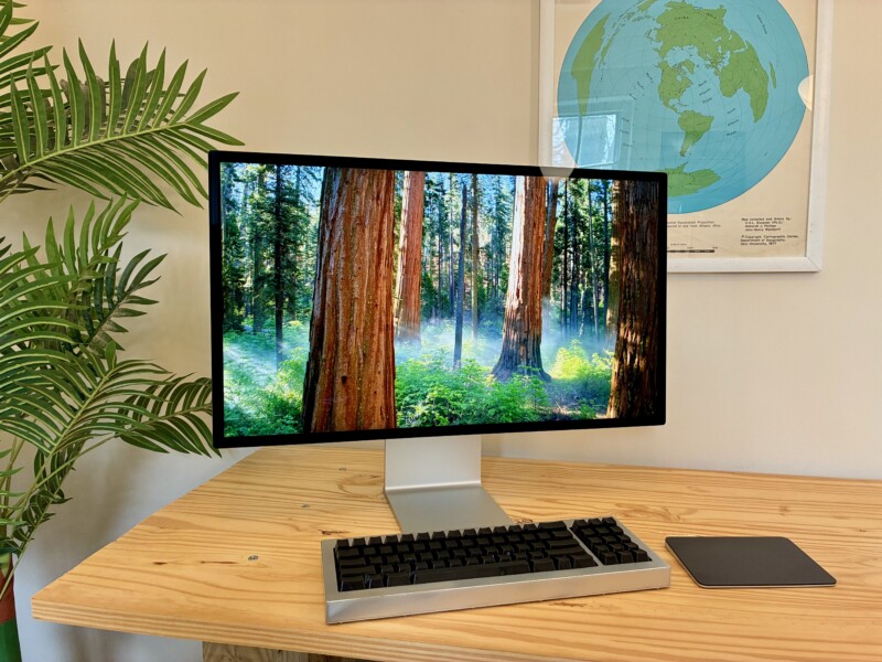 The Studio Display XDR showing a sequoia Aerial screensaver