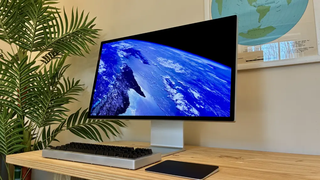 The Studio Display XDR showing a space Aerial screensaver