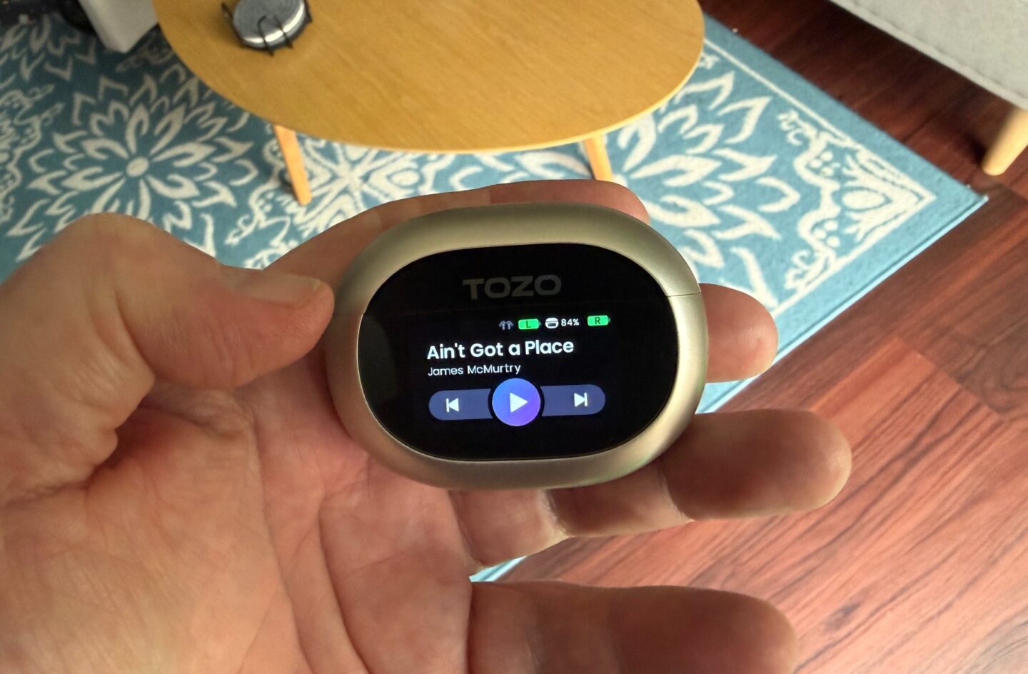 Tozo NC20 Pro touchscreen with music info