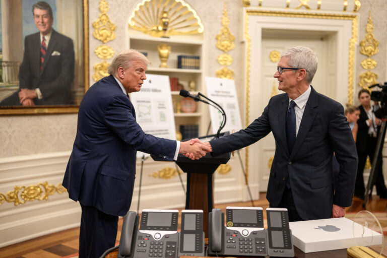 President Donald Trump shakes hands with Apple CEO Tim Cook before announcing a $100 billion investment in the U.S., Wednesday, August 6, 2025, in the Oval Office.