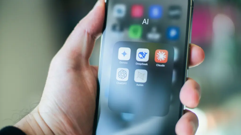 A photo illustrating AI apps on the iPhone in a story about Apple possibly opening up the App Store for AI agents.