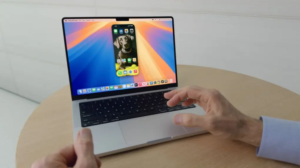 A photo of the iPhone Mirroring feature on Mac used in a story about new features coming to macOS 27.