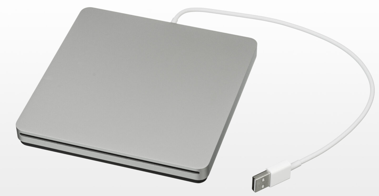 Apple SuperDrive An Apple SuperDrive, a slim aluminum optical drive with a USB cable