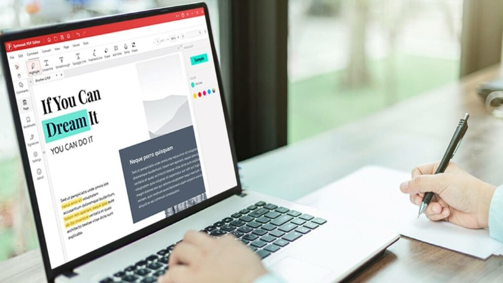 Person editing a PDF on a laptop using Systweak PDF Editor Pro