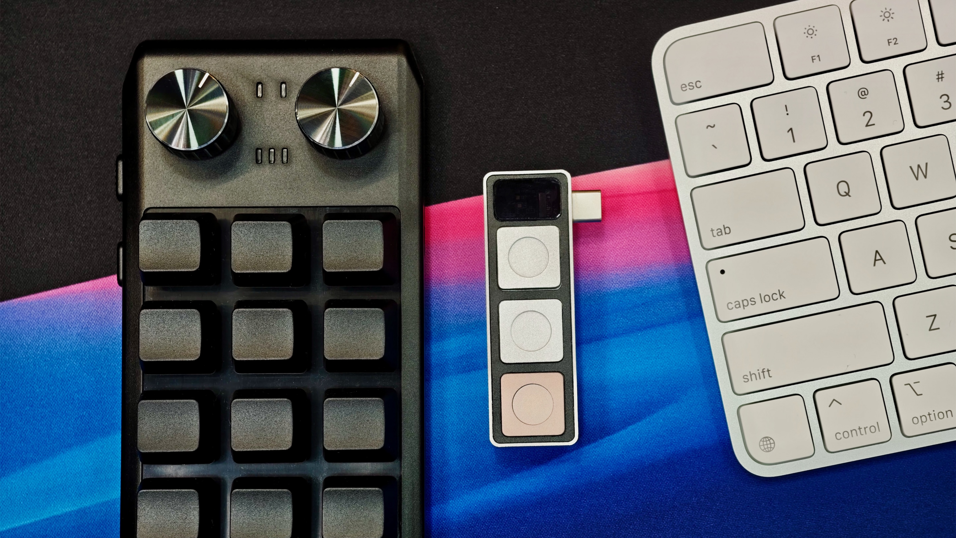 Dune macro pad apple keyboard Project Mirage's Dune next to a 12-key macro pad and Apple Magic Keyboard.