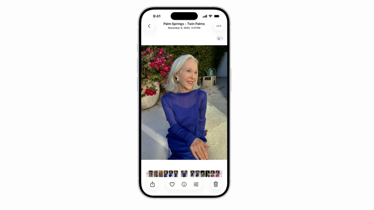 A picture of Apple Photos app on an iPhone, used in a story about a class action lawsuit on Apple.