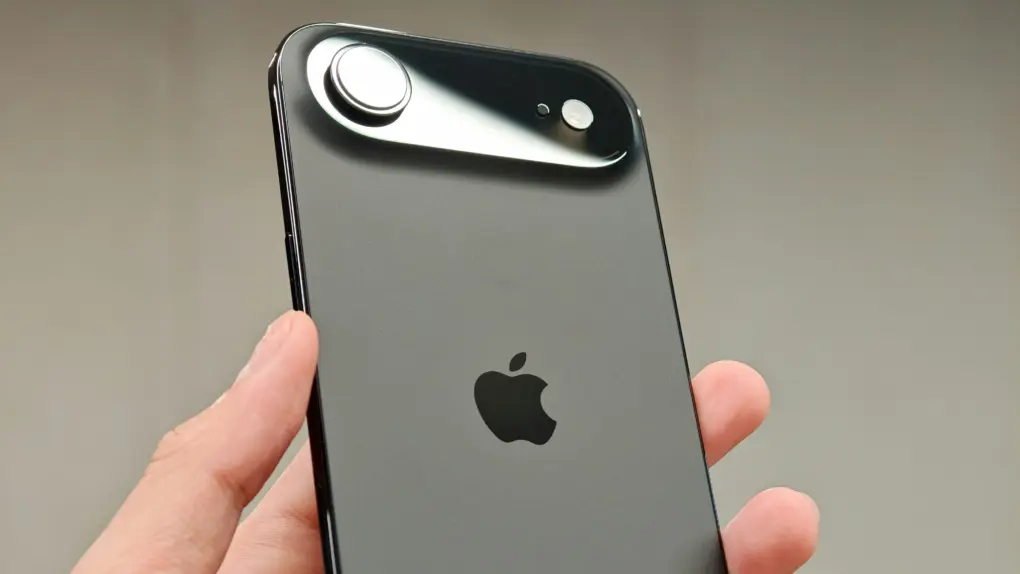 iPhone Air held in hand.
