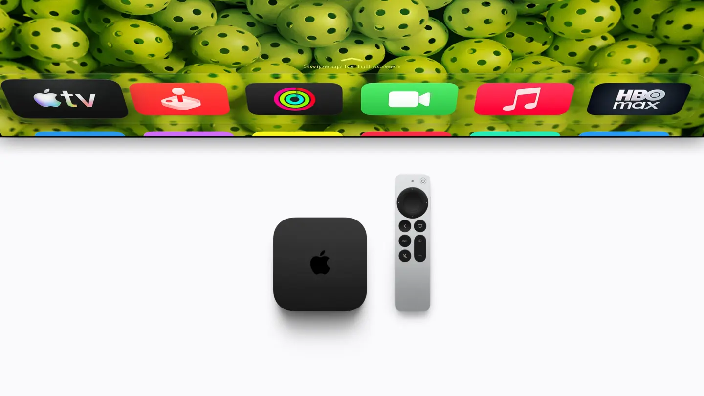 Apple TV 4K (4th generation) in front of a TV.