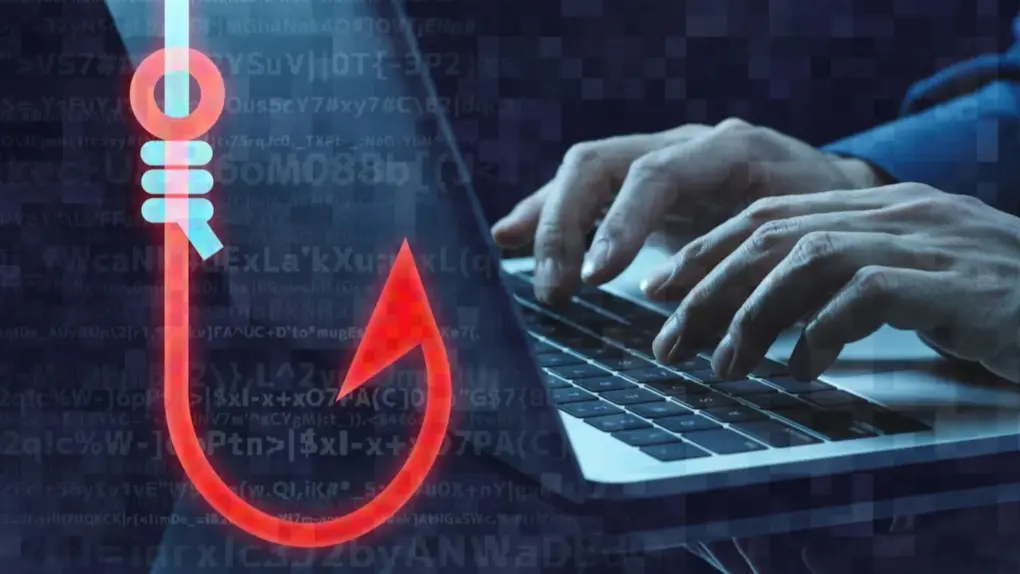 A picture showing a fishing hook with a laptop in the background used in a story about fake Zoom installer on macOS.