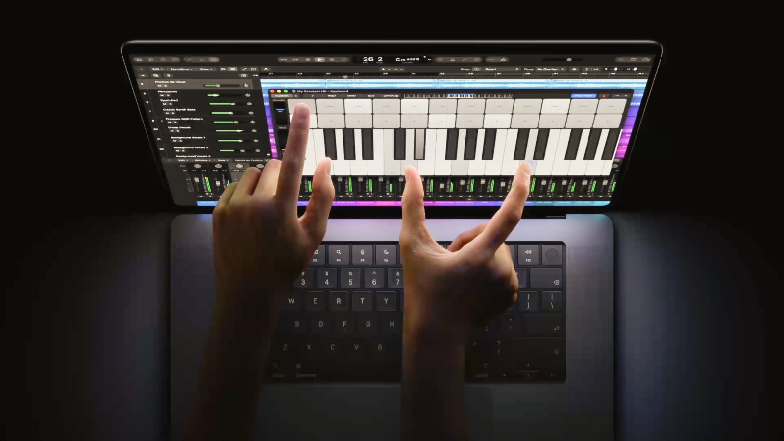 Person using touchscreen MacBook Pro for music production Photo of person using touchscreen MacBook Pro for music production, showing two hands touching the screen