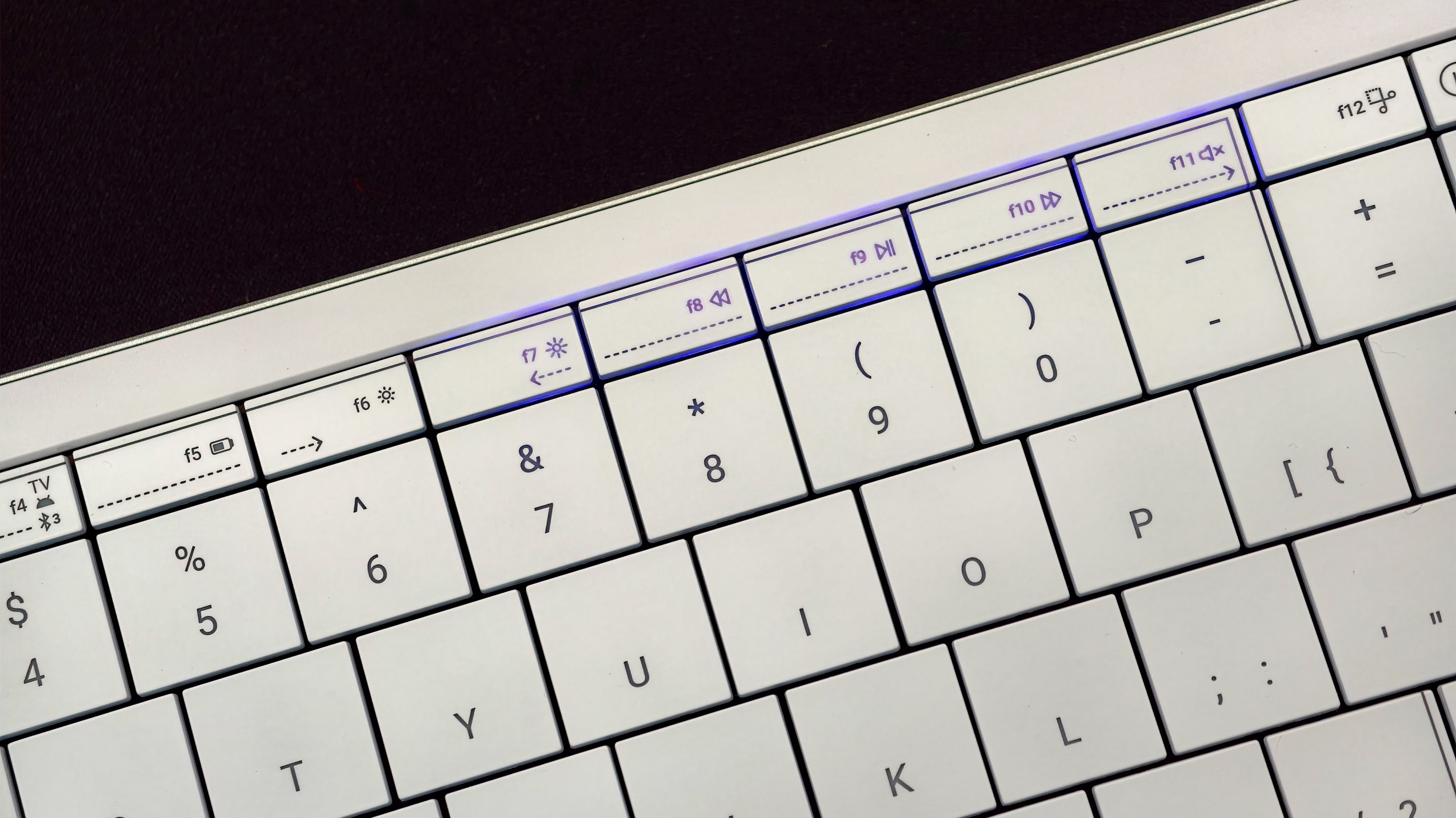 Clevetura s touch controls Clevetura S keyboard with touch sliders for brightness and volume