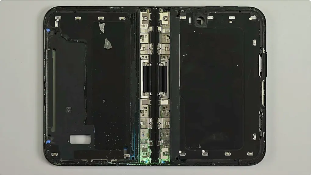 Screengrab showing iPhone Duo hinge as seen in iFixit teardown